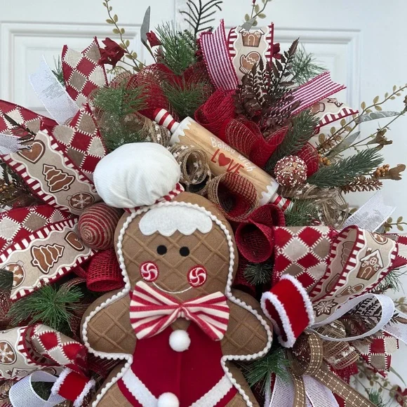 Adorable Red and White Gingerbread Holiday Wreath. Aprox 26” wide